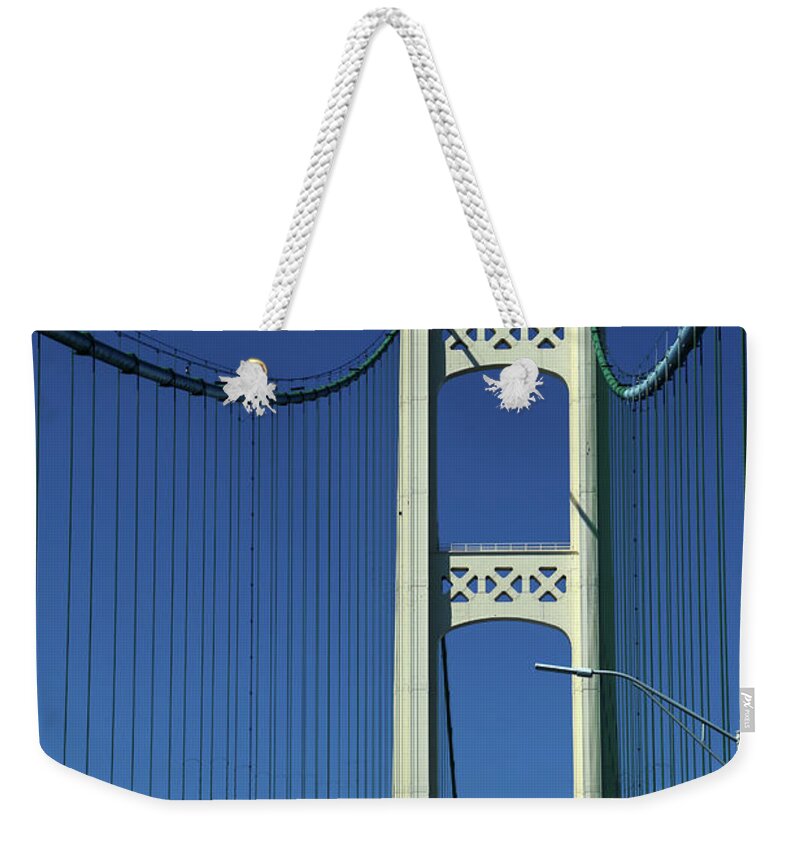 Mackinac Bridge Weekender Tote Bag featuring the photograph Two Towers Mackinac Bridge by Mary Bedy