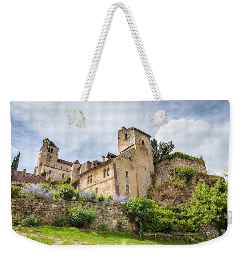 Blue Weekender Tote Bag featuring the photograph Typical architecture in Saint Circ Lapopie by Semmick Photo