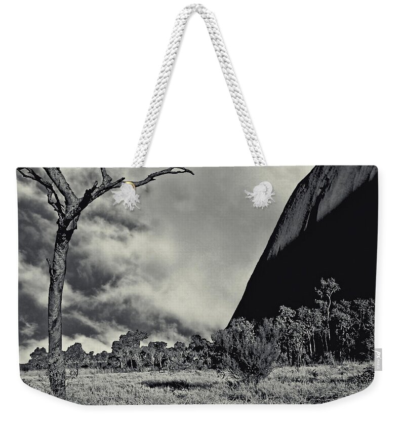 Uluru Weekender Tote Bag featuring the photograph Uluru aka Ayers Rock with Dead Tree by Roger Passman