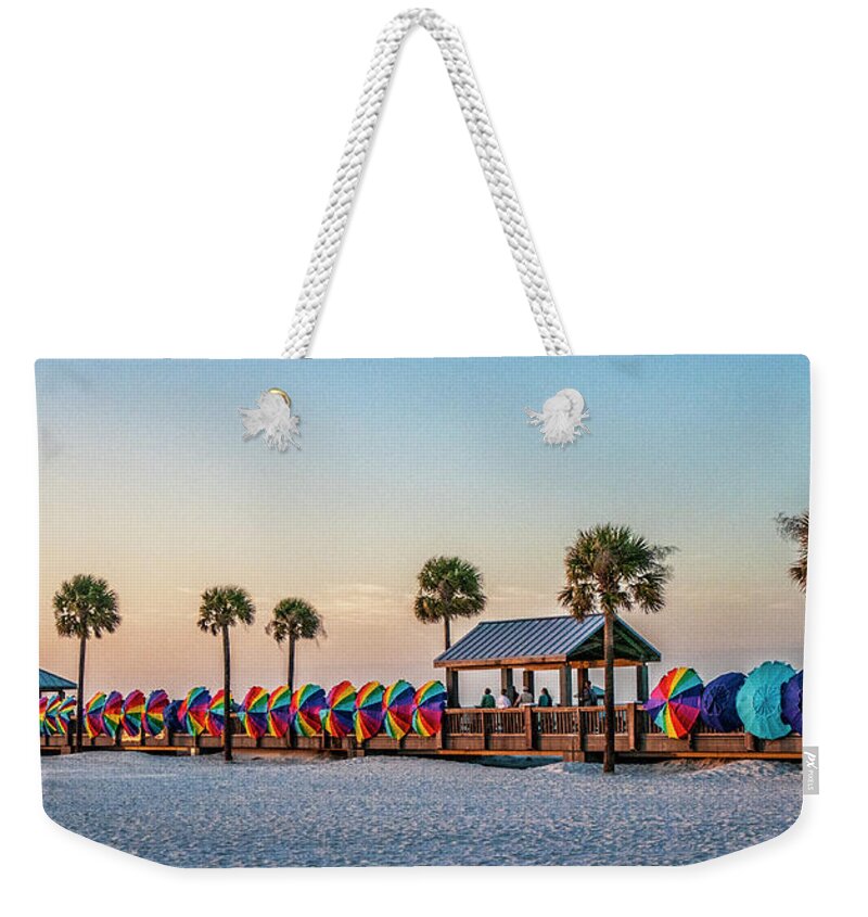 Umbrellas Weekender Tote Bag featuring the photograph Umbrella windbreaks at Clearwater Florida. by Brian Tarr
