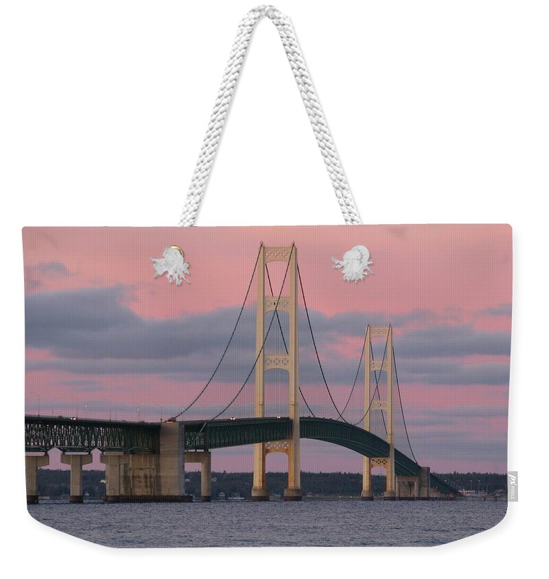 Mackinac Bridge Weekender Tote Bag featuring the photograph Under a Rose Colored Sky by Keith Stokes