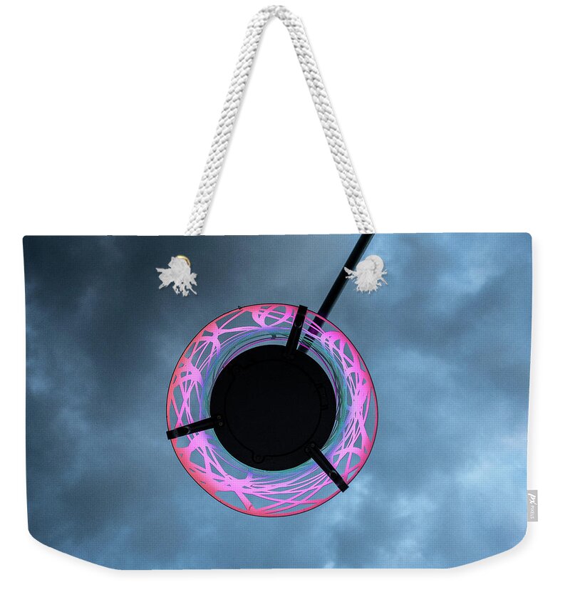 Rva Weekender Tote Bag featuring the photograph Under the Glow by Doug Ash
