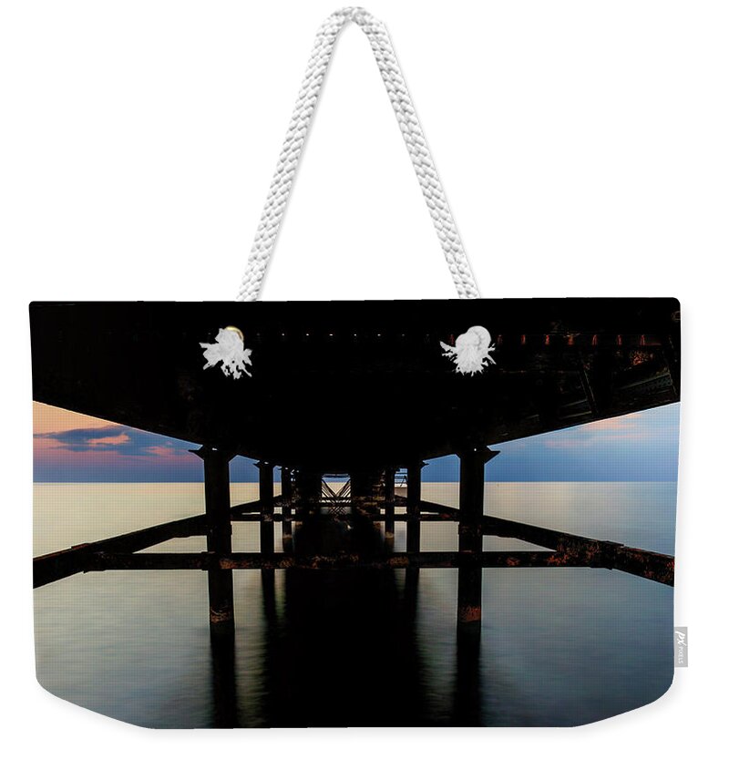 Long Weekender Tote Bag featuring the photograph Under The Pier by Stelios Kleanthous