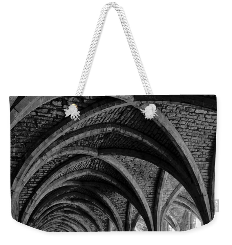 Monochrome Photography Weekender Tote Bag featuring the photograph Under the vaults. Vertical. by Elena Perelman
