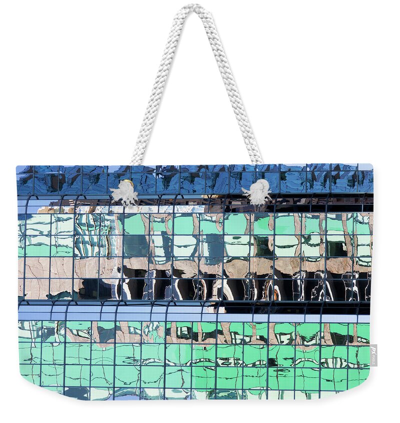 Abstract Weekender Tote Bag featuring the photograph Urban Reflections by Ramunas Bruzas