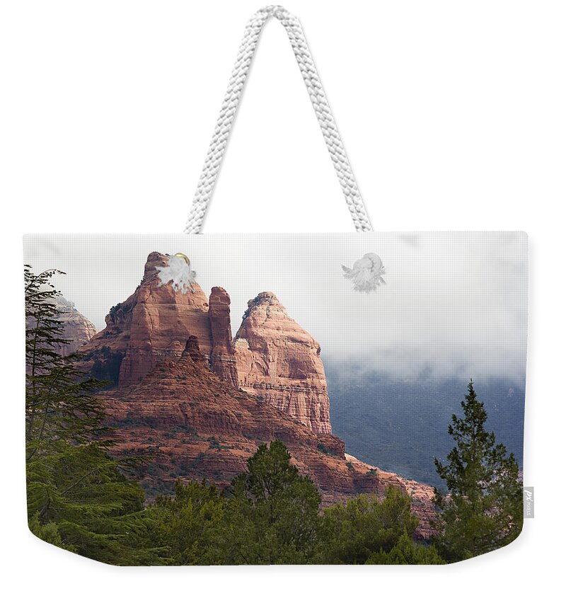 Mountains Weekender Tote Bag featuring the photograph Veiled In Clouds by Phyllis Denton
