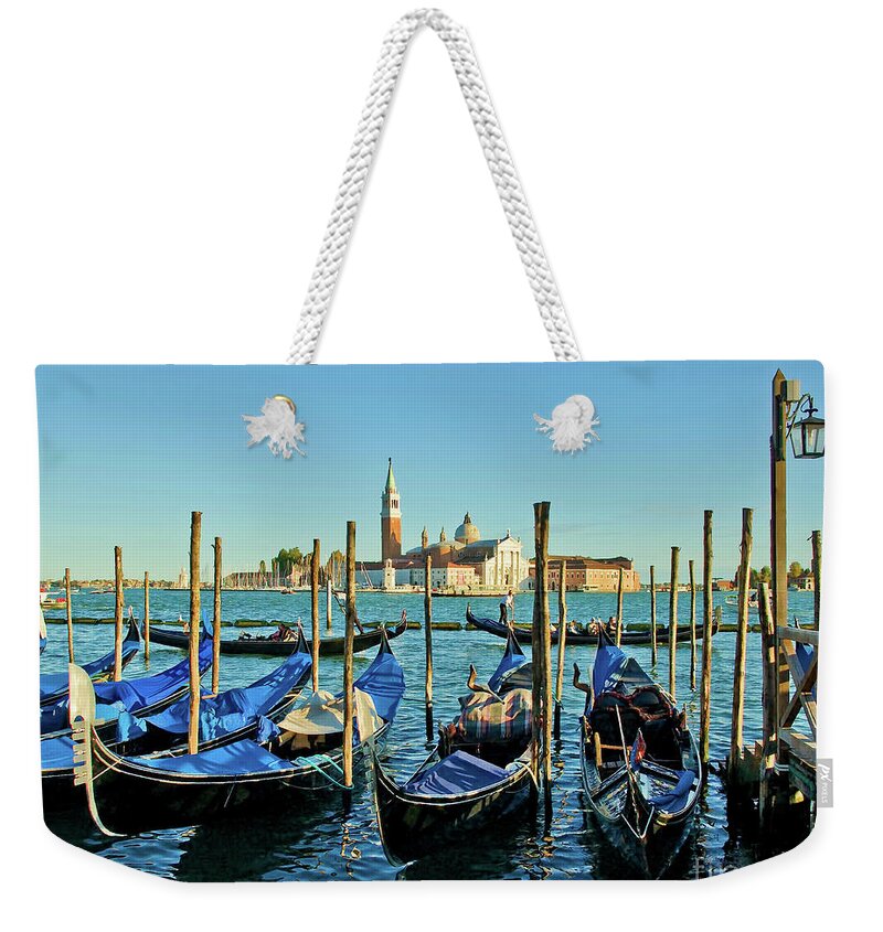 Venetian Gondolas Weekender Tote Bag featuring the photograph Venice gondolas - evening by Maria Rabinky