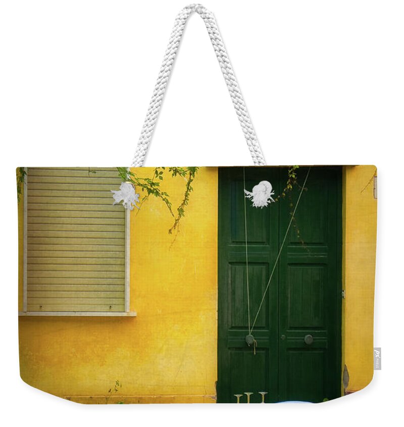Ventotene Weekender Tote Bag featuring the photograph Ventotene Cafe by Doug Sturgess