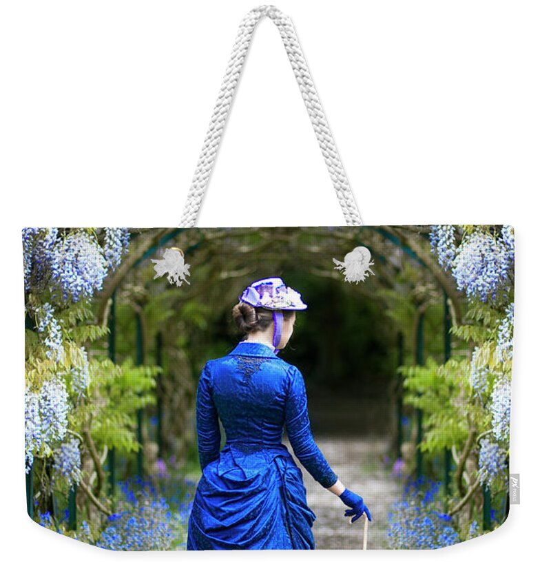 Victorian Weekender Tote Bag featuring the photograph Victorian Woman With Wisteria by Lee Avison