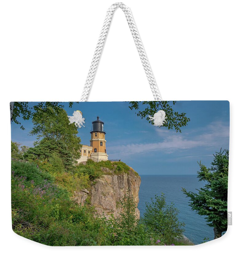 Lake Superior Weekender Tote Bag featuring the photograph View of Split Rock Lighthouse by Gary McCormick