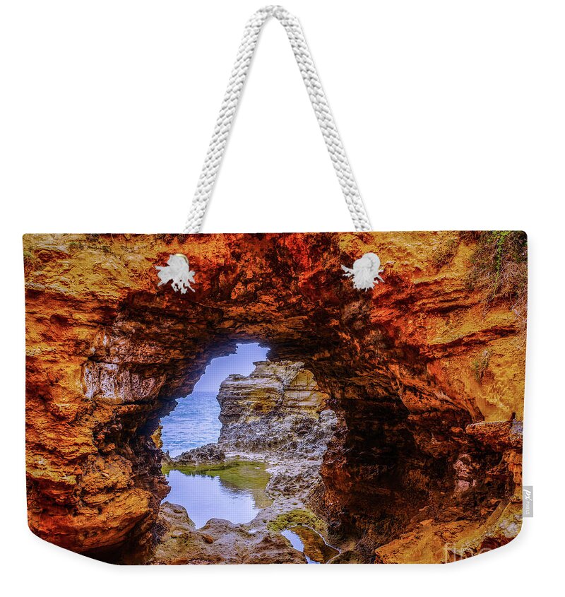 The Grotto At Twelve Apostles Great Ocean Road Australia Weekender Tote Bag featuring the photograph View Through the Grotto by Lexa Harpell