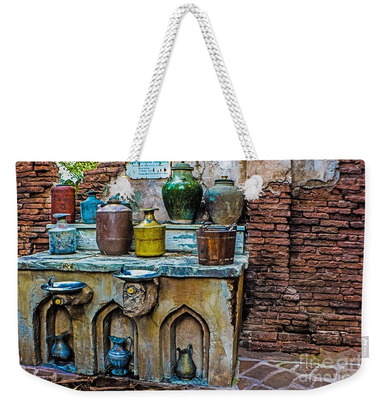 Antique Weekender Tote Bag featuring the photograph Vintage Antique Water Containers 2 by Gary Keesler