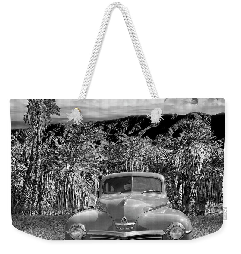 Car Weekender Tote Bag featuring the photograph Vintage Blue Plymouth Automobile in Black and White by Randall Nyhof