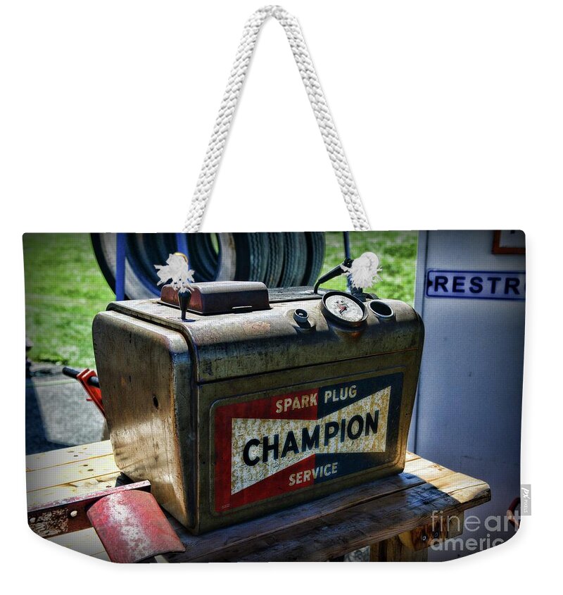 Paul Ward Weekender Tote Bag featuring the photograph Vintage Champion Spark Plug Cleaner by Paul Ward
