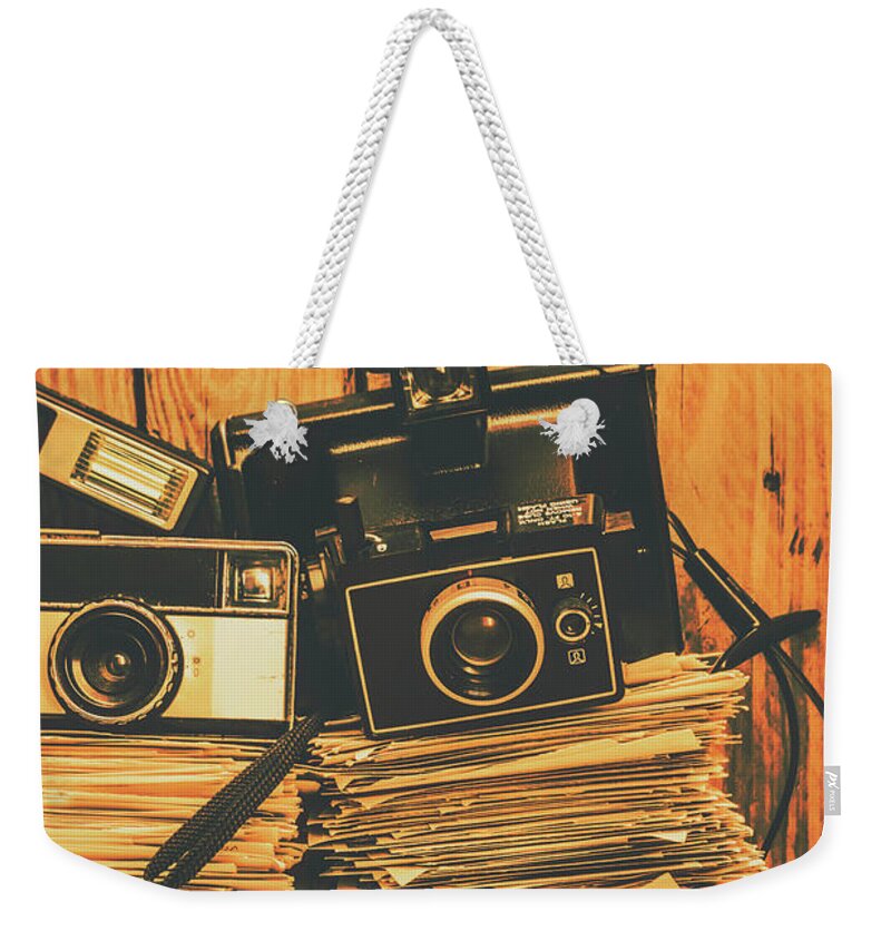 Nostalgia Weekender Tote Bag featuring the photograph Vintage photography stack by Jorgo Photography