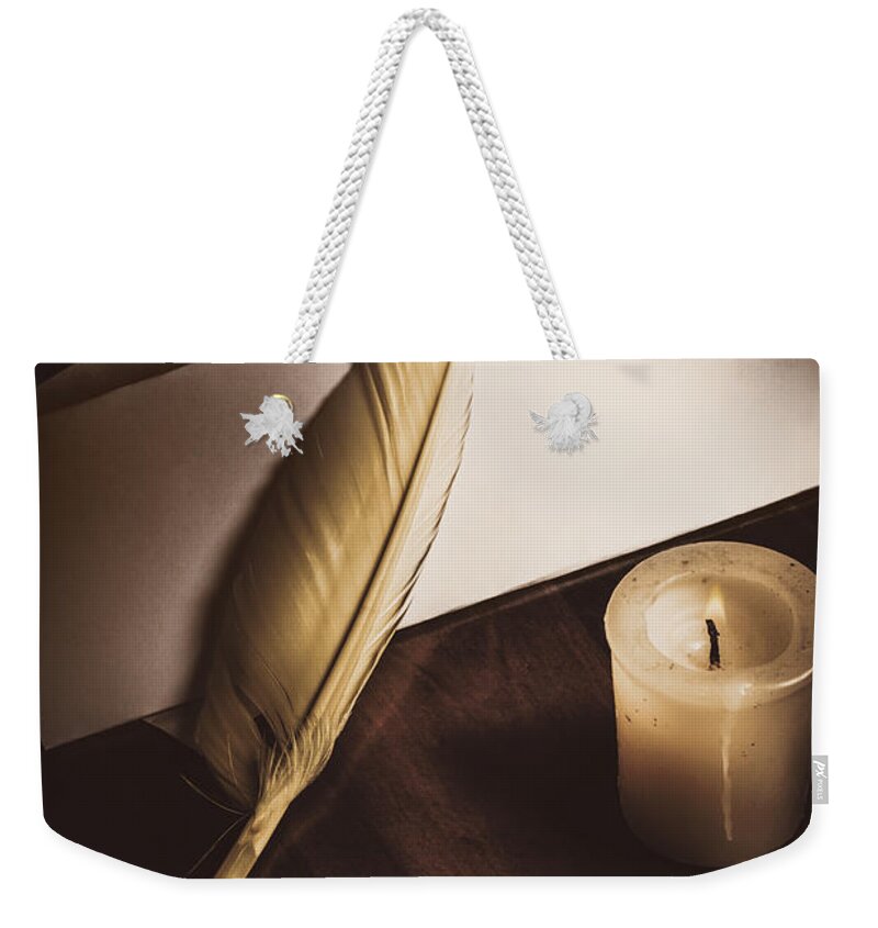 Candle Weekender Tote Bag featuring the photograph Vintage still life quill pen and old paper by Jorgo Photography
