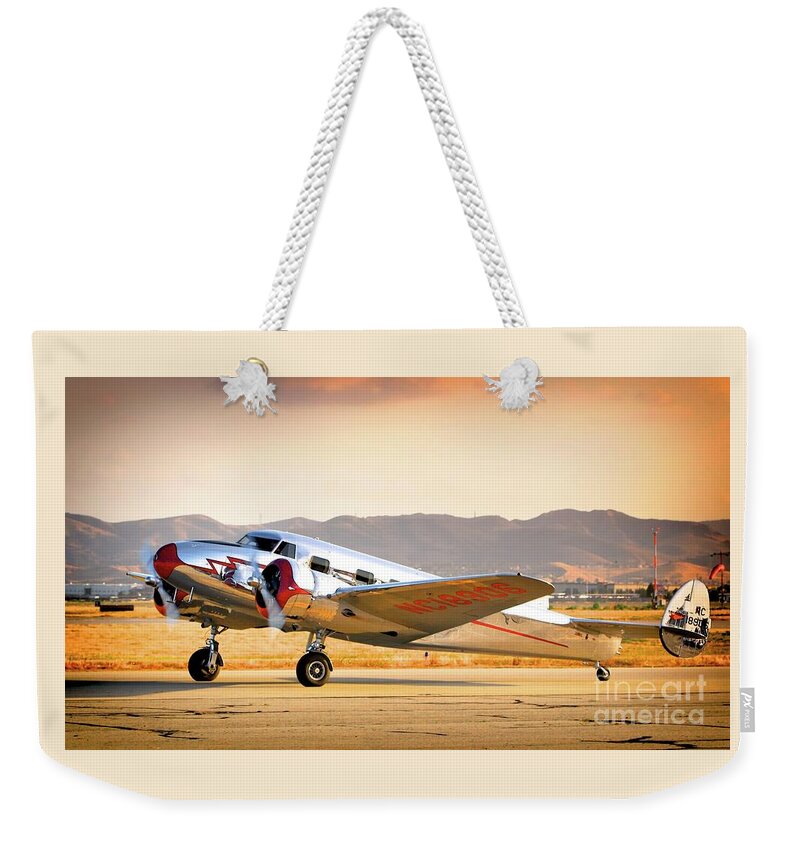 Aircraft Weekender Tote Bag featuring the photograph Les Whittlesey's Lockheed Electra 12A by Gus McCrea
