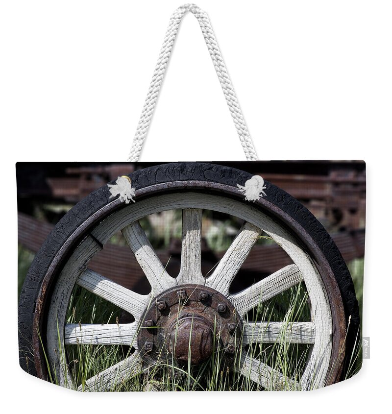 Old West Weekender Tote Bag featuring the photograph Wagon Wheel by Kelley King