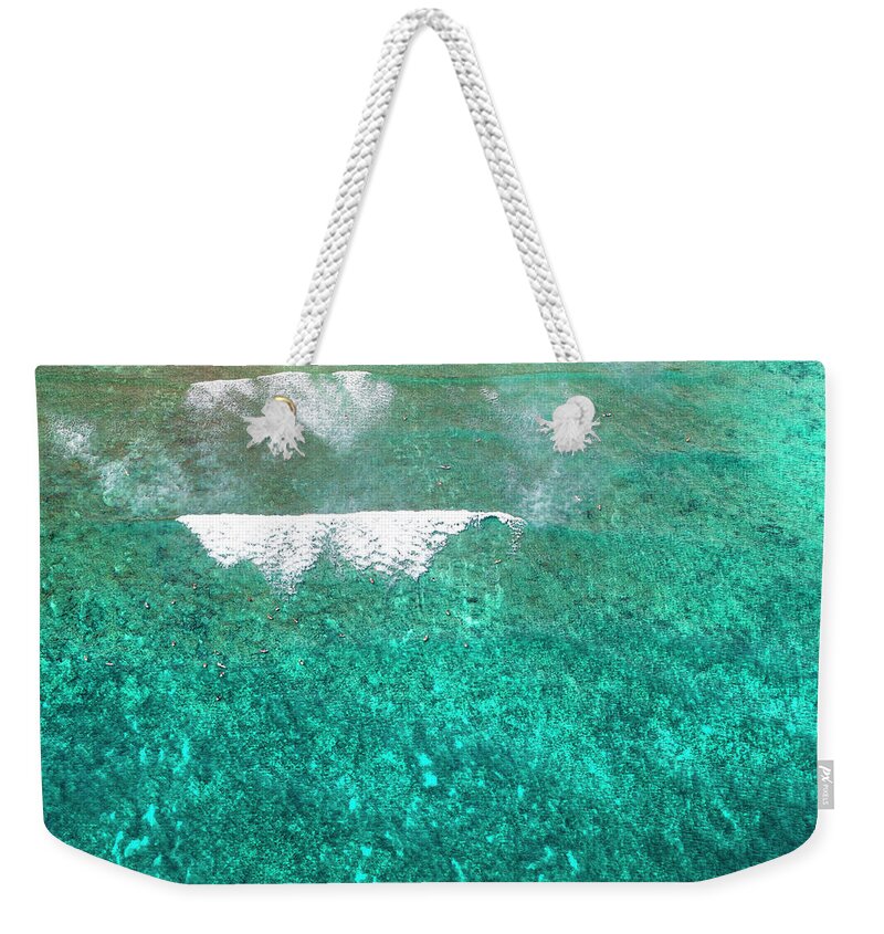 Helicopter Weekender Tote Bag featuring the photograph Waikiki Surfers by Sean Davey