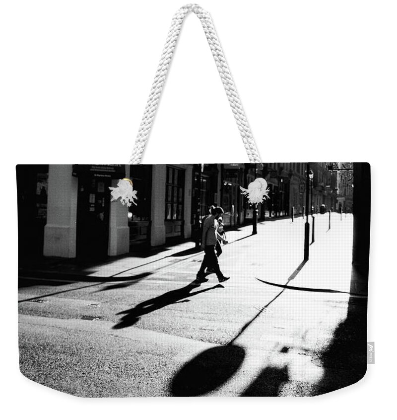 London Weekender Tote Bag featuring the photograph Walking in London by Lora Lee Chapman