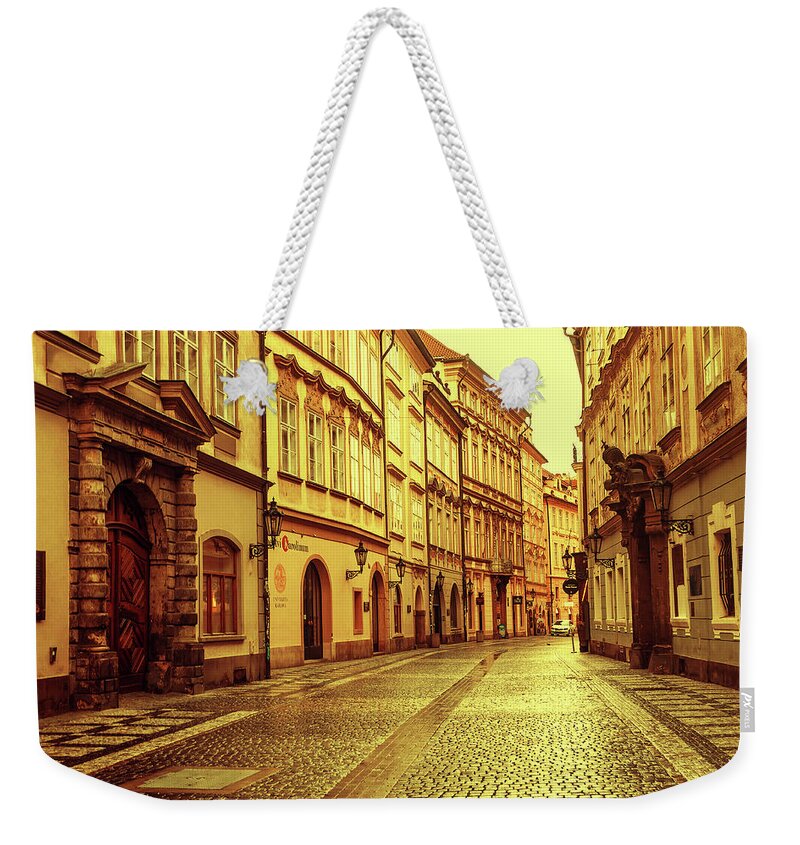 Jenny Rainbow Fine Art Photography Weekender Tote Bag featuring the photograph Walking in Prague. Series Golden Prague by Jenny Rainbow