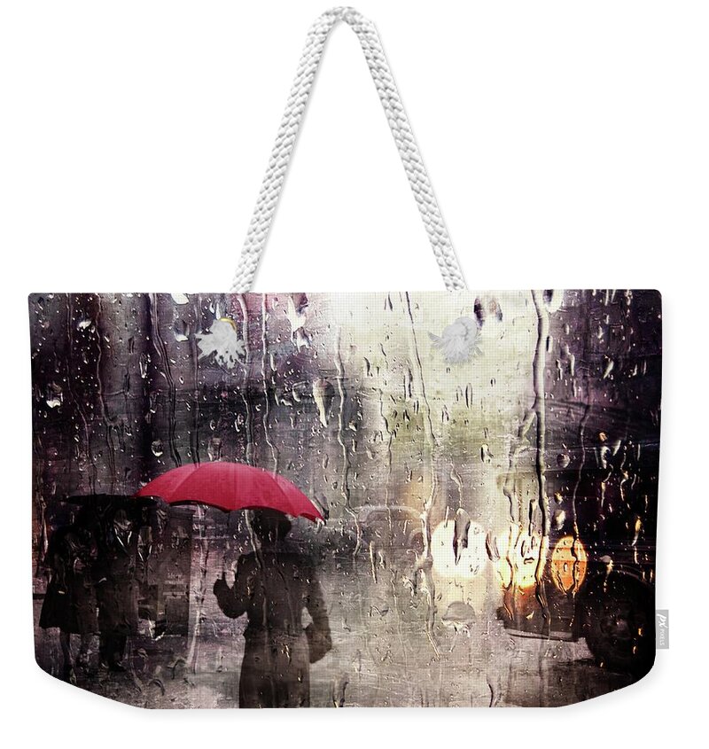 Walking In The Rain Somewhere Weekender Tote Bag featuring the photograph Walking in the Rain Somewhere by Carlos Diaz