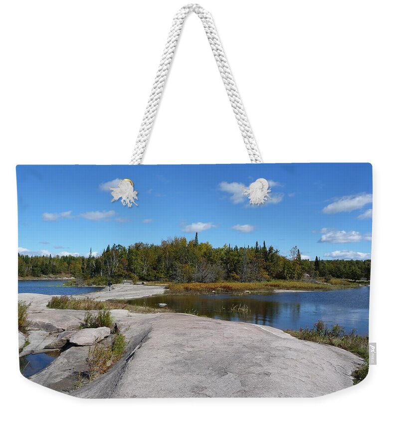 Rocks Weekender Tote Bag featuring the photograph Walking on the whale's back by Ruth Kamenev