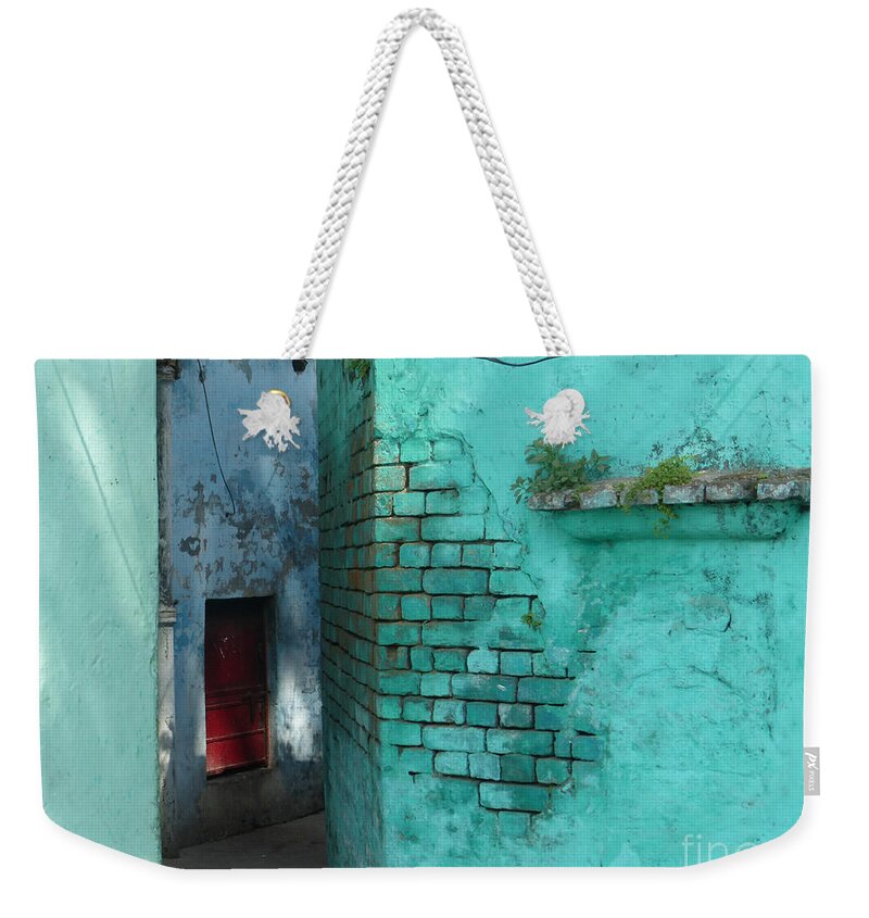 Wal Weekender Tote Bag featuring the photograph Walls by Jean luc Comperat
