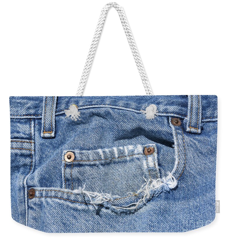 Worn Weekender Tote Bag featuring the photograph Worn Jeans by George Robinson