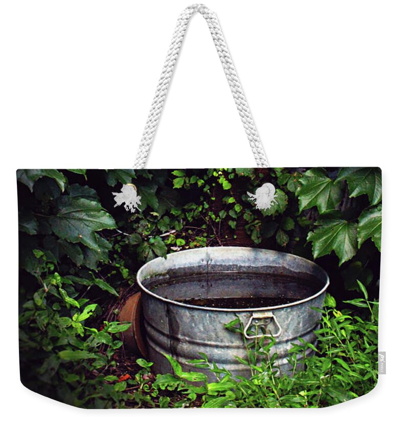 Water Weekender Tote Bag featuring the photograph Water Bearer by Jessica Brawley