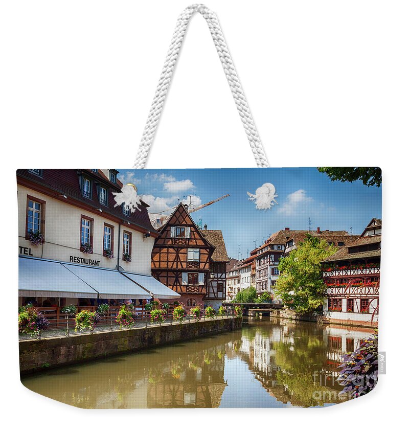 Strasbourg Weekender Tote Bag featuring the photograph water canal in Strasbourg, France by Ariadna De Raadt