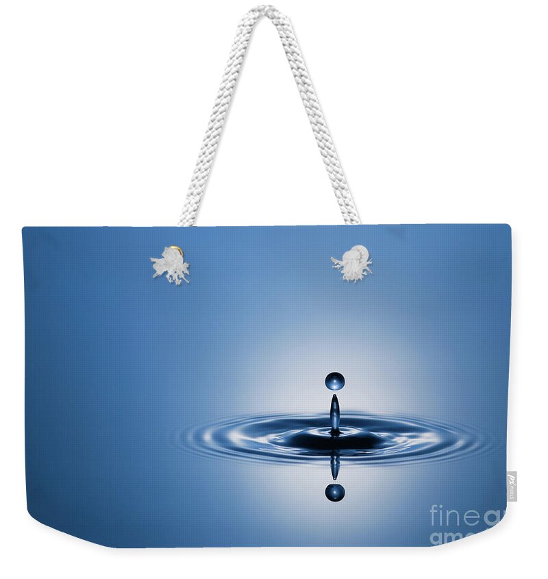 Abstract Weekender Tote Bag featuring the photograph Water Drop in Blue 1 by Dean Birinyi