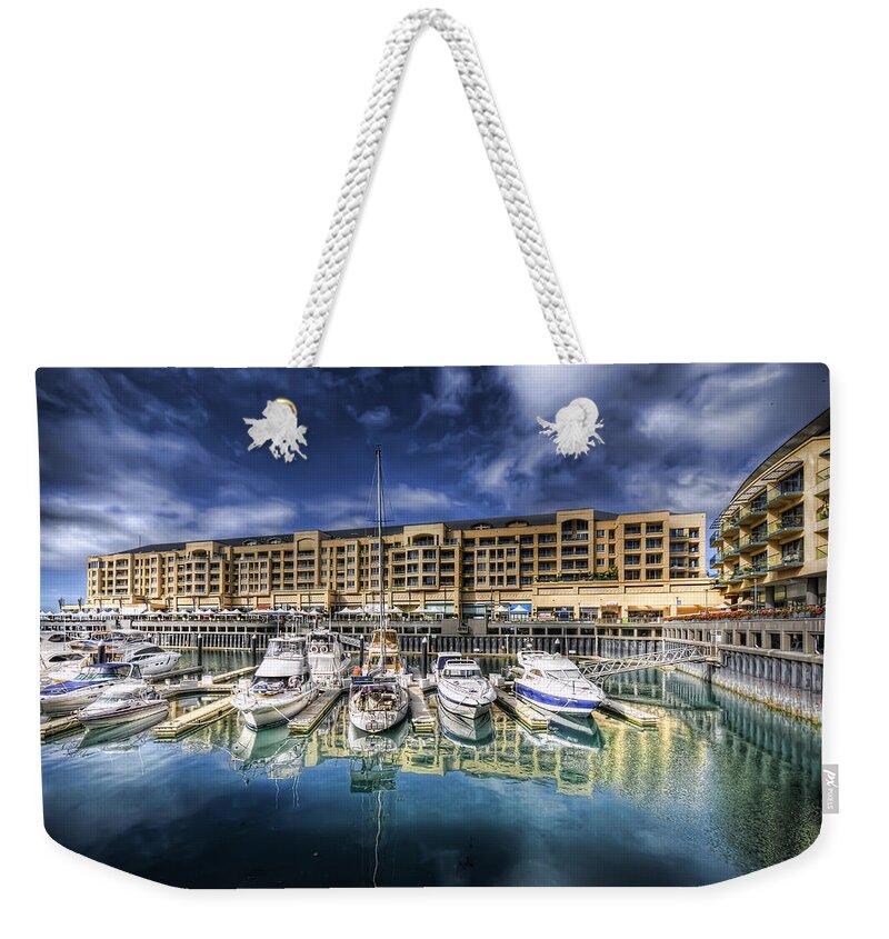Marina Weekender Tote Bag featuring the photograph Water World by Wayne Sherriff