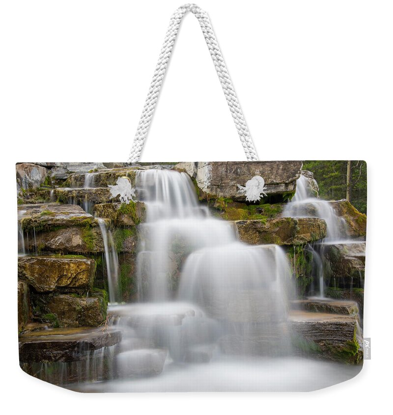 Water Weekender Tote Bag featuring the photograph Waterfalls and Stones by Bill Cubitt