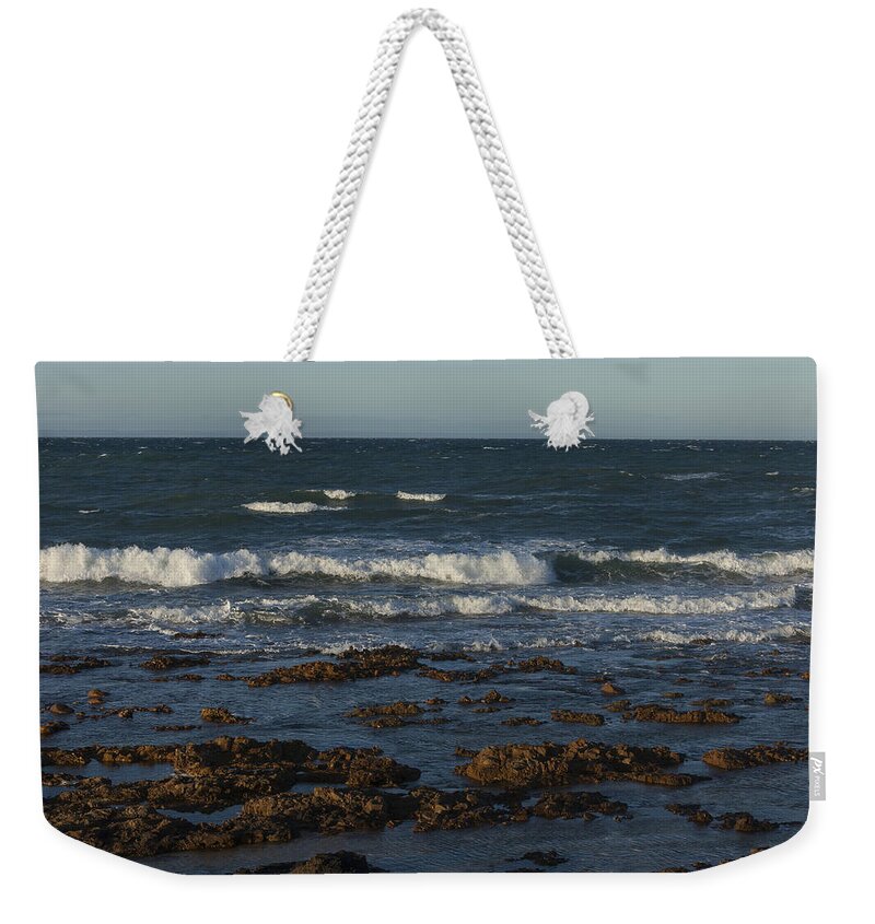 Waves Weekender Tote Bag featuring the photograph Waves rolling ashore by David Watkins