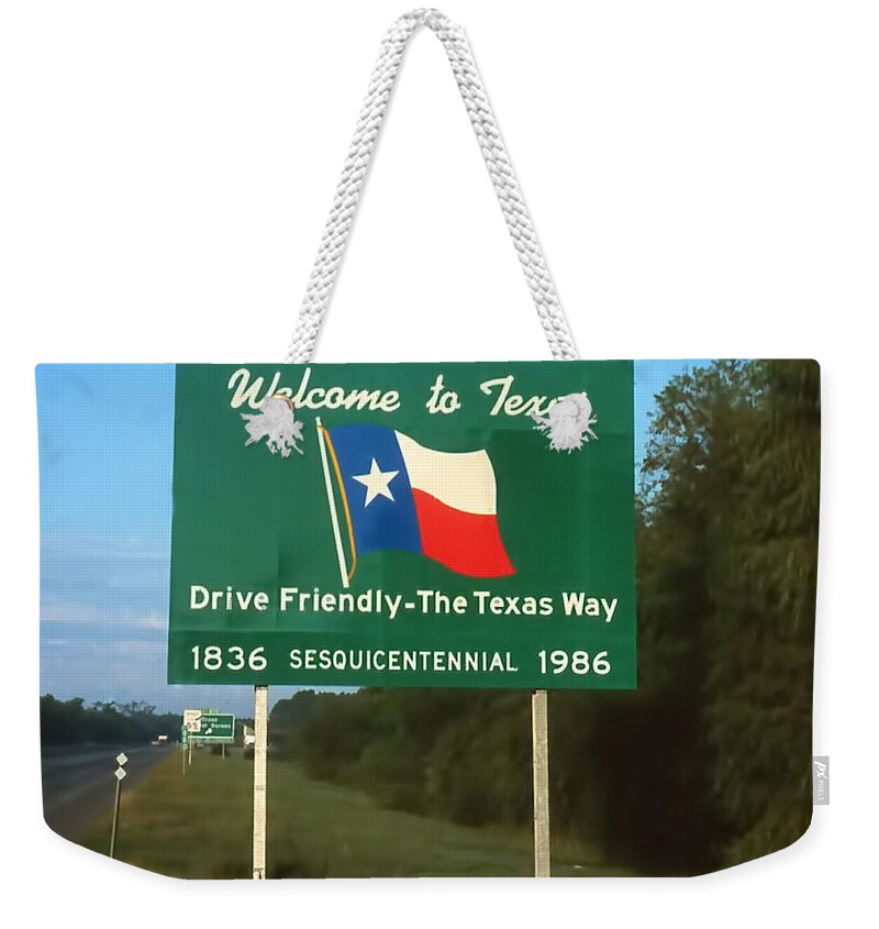 Texas Sign Weekender Tote Bag featuring the photograph Welcome to Texas by Cathy Anderson
