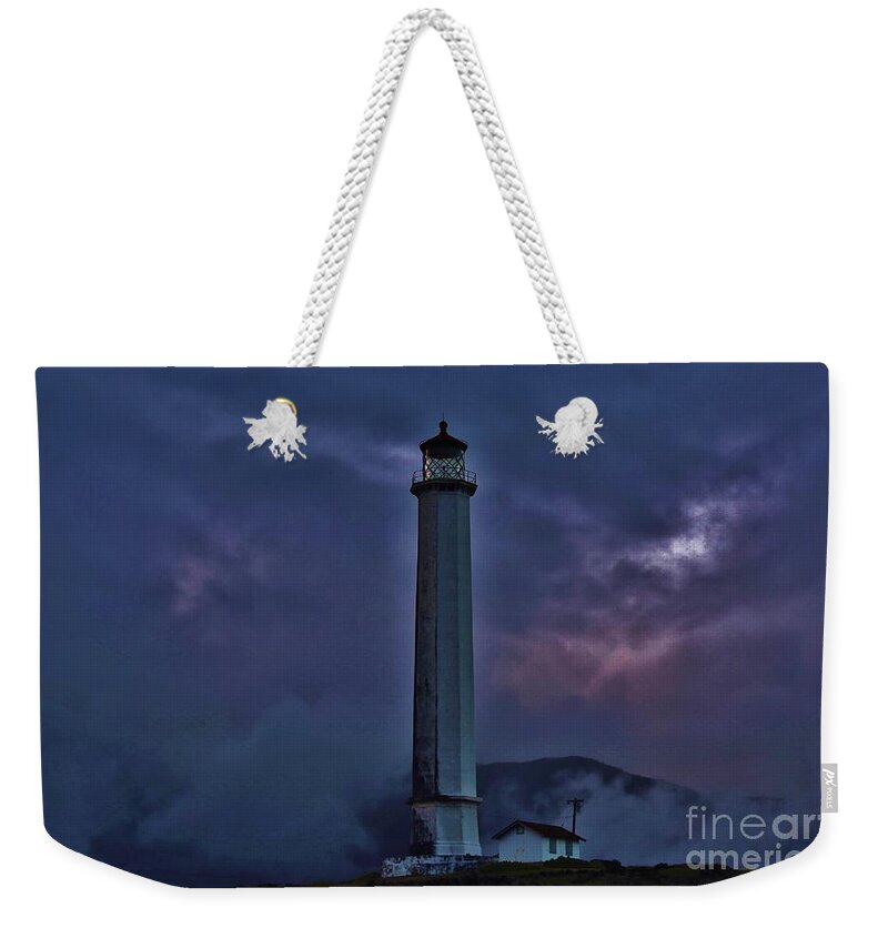 Molokai Lighthouse Weekender Tote Bag featuring the photograph Wet and Foggy Morning by Craig Wood