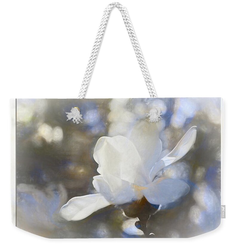 Beauty Weekender Tote Bag featuring the photograph White Magnolia flower blossom in the sunlight by Natalie Rotman Cote