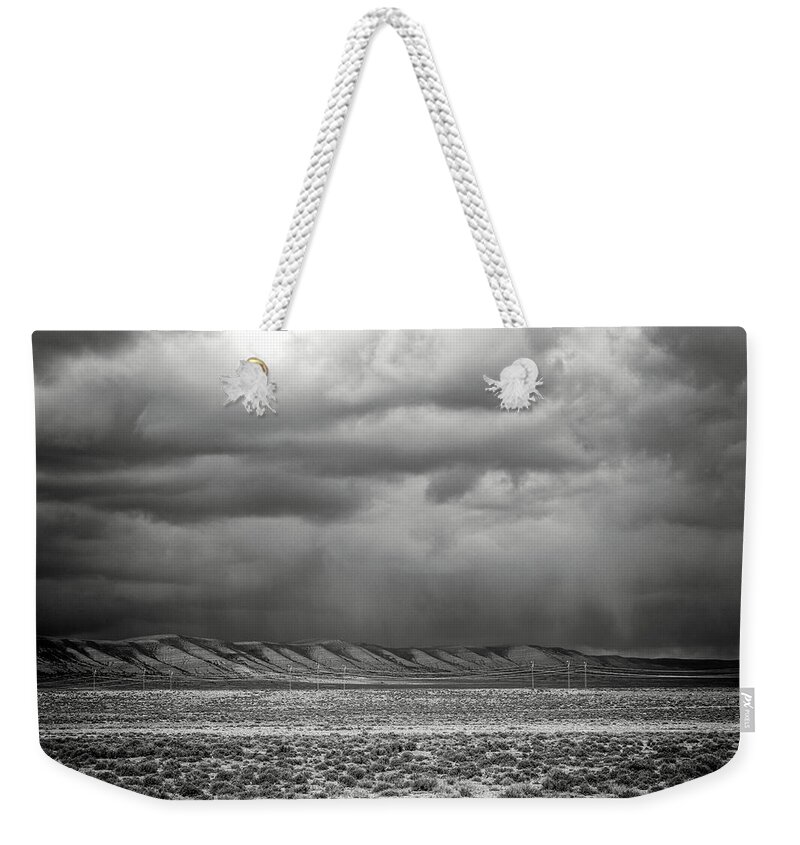 White Mountain Weekender Tote Bag featuring the photograph White Mountain by Lou Novick