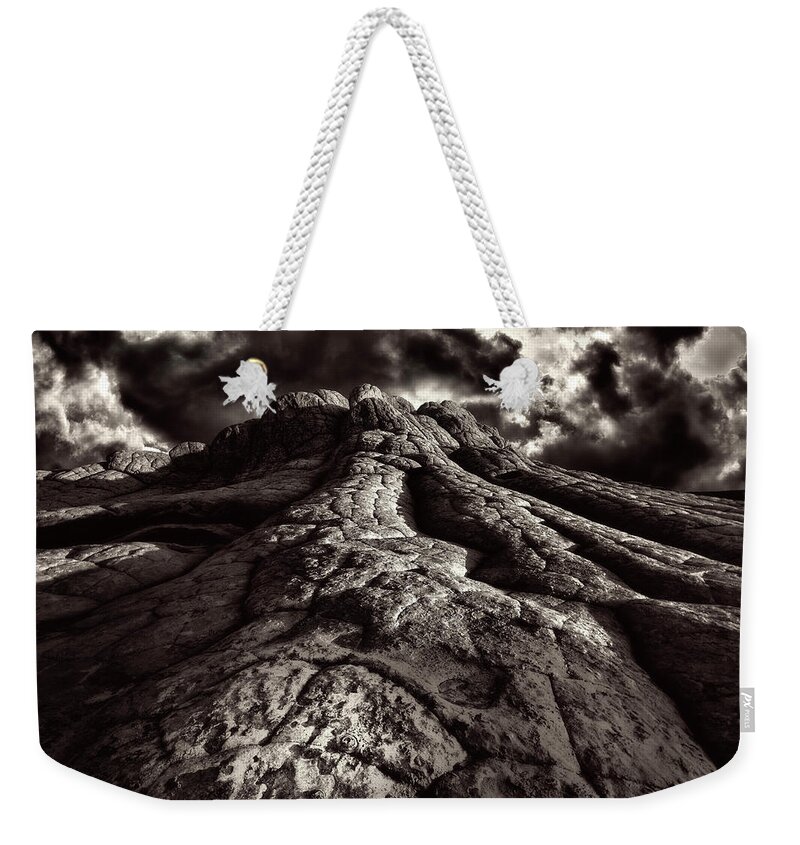 Black And White Weekender Tote Bag featuring the photograph White Pockets in Black and White by Michael Ash