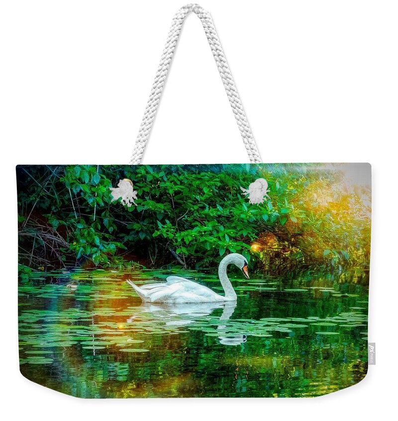 White Swan Weekender Tote Bag featuring the photograph White swan by Lilia S