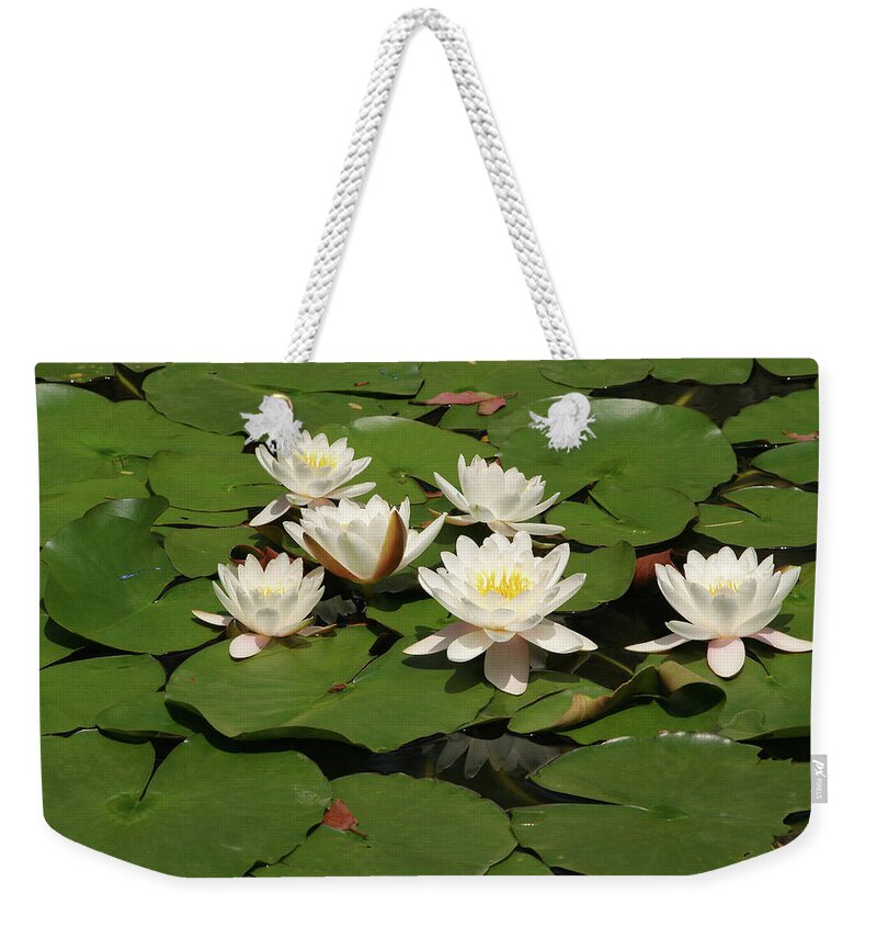 Water Lilies Weekender Tote Bag featuring the photograph White Water Lilies by Art Block Collections
