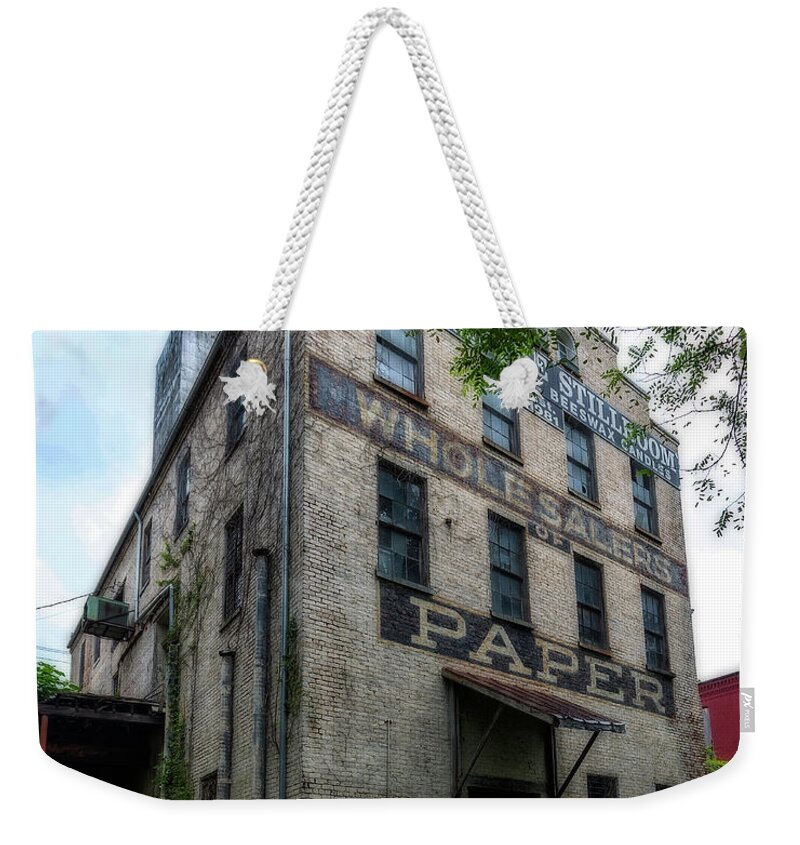 Old Weekender Tote Bag featuring the photograph Wholesalers Paper by Alan Raasch