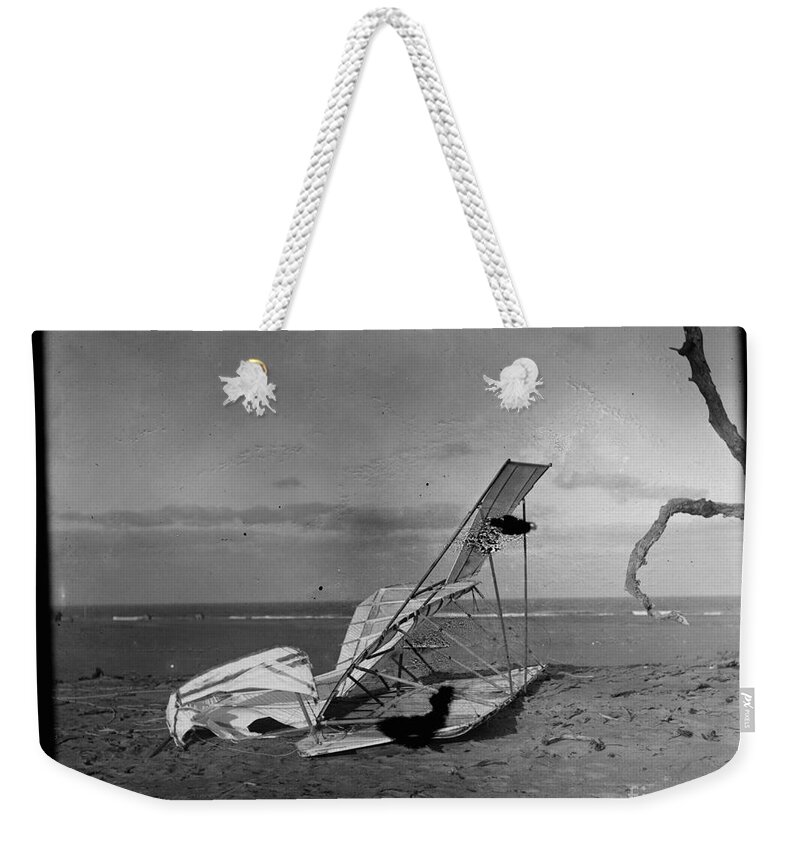 Wilbur And Orville Wright Crumpled Glider Wrecked By The Wind On Hill Of The Wreck Named After A Shipwreck Weekender Tote Bag featuring the photograph Wilbur and Orville Wright Crumpled glider wrecked by the wind on Hill of Wreck named after shipwreck by Vintage Collectables