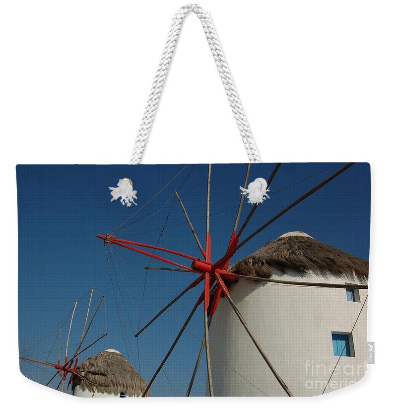 Mykonos Weekender Tote Bag featuring the photograph Windmills by Joe Ng