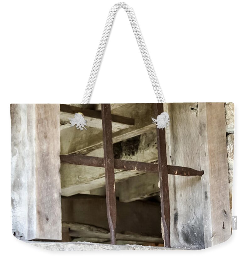 Window In The Amana Farmer's Market Barn Amana Ia Weekender Tote Bag featuring the photograph Window in the Amana Farmer's Market Barn Amana IA by Cynthia Woods