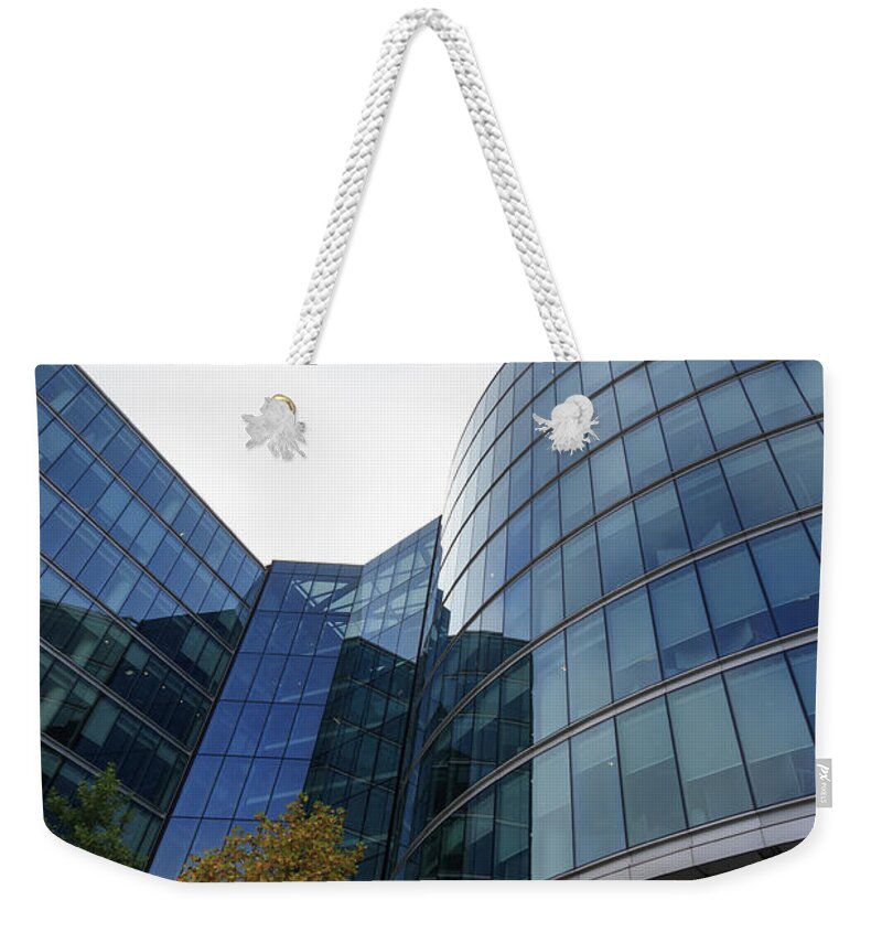 Buildings Weekender Tote Bag featuring the photograph Windows of Skyscraper by Chris Smith