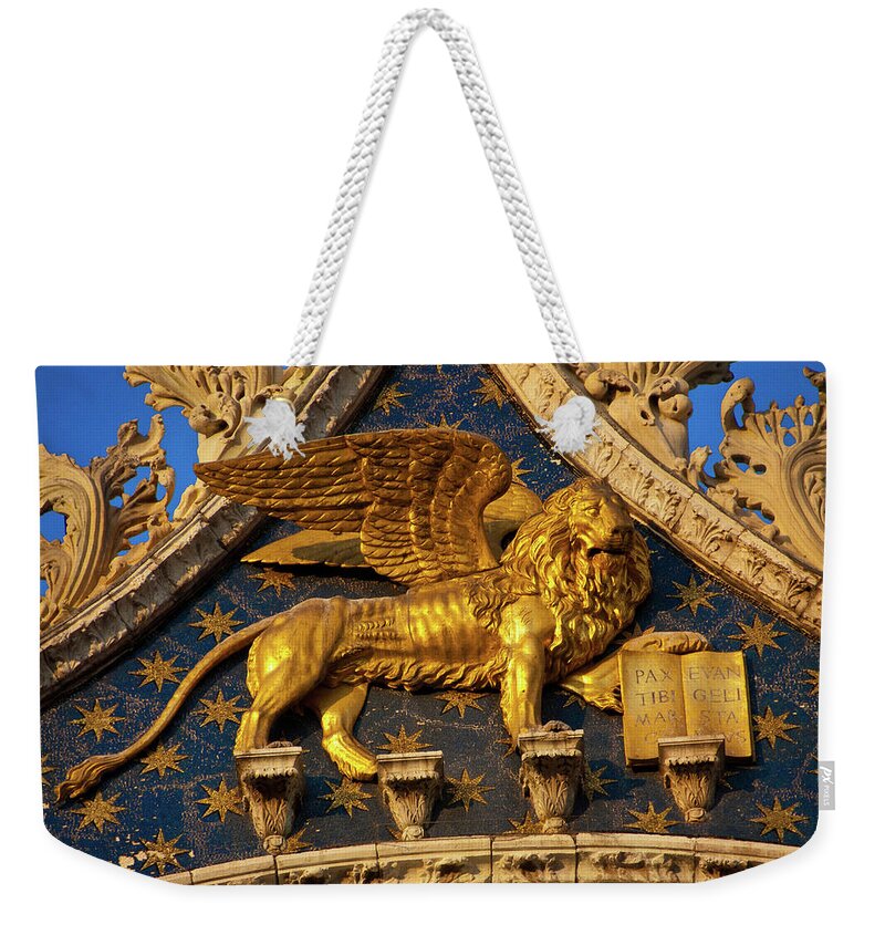 Winged Lion Weekender Tote Bag featuring the photograph Winged Lion by Harry Spitz