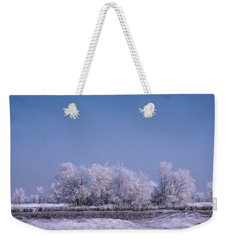 Frozen Trees Winter North Dakota Weekender Tote Bag featuring the photograph Winter Ice Tree by William Kimble