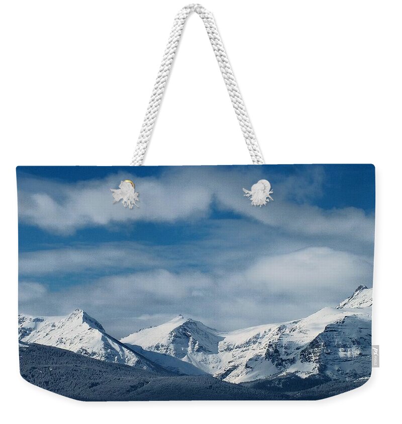 Winter Weekender Tote Bag featuring the photograph Winter in the Rockies by Tracey Vivar